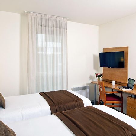 Sejours & Affaires Rennes Longs Champs Aparthotel Bagian luar foto